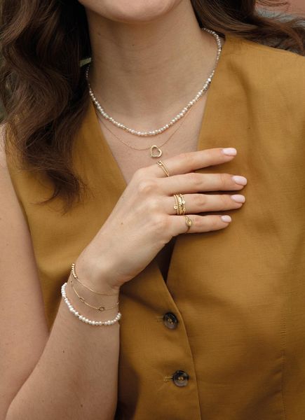 Jackie Gold Dangling White Topaz Ring JKR24.416 Anillo para mujeres Jackie Gold Dangling White Topaz Ring JKR24.416 Anillo para mujeres